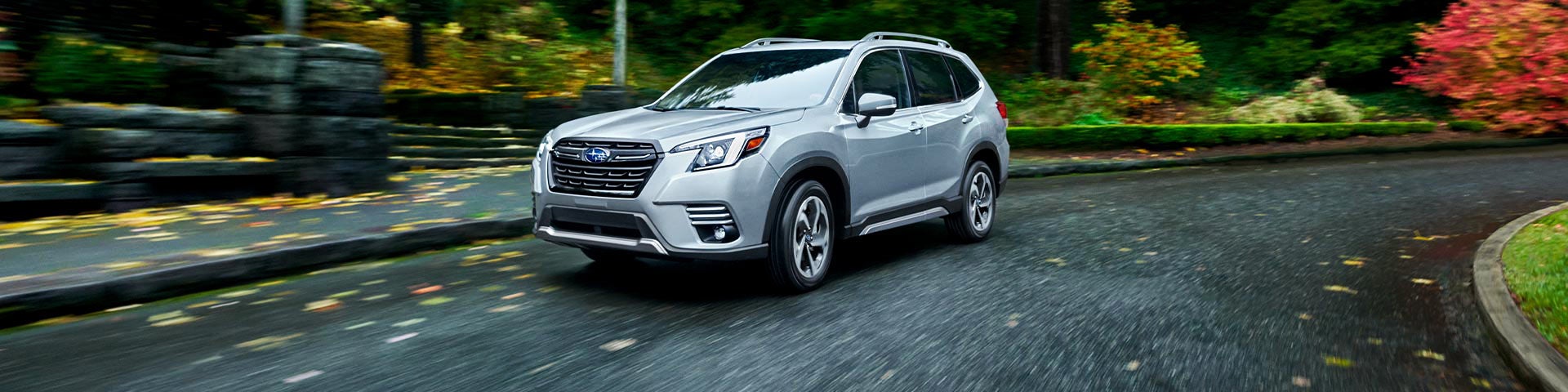 A 2022 Forester driving on a highway. | Island Subaru in Staten Island NY