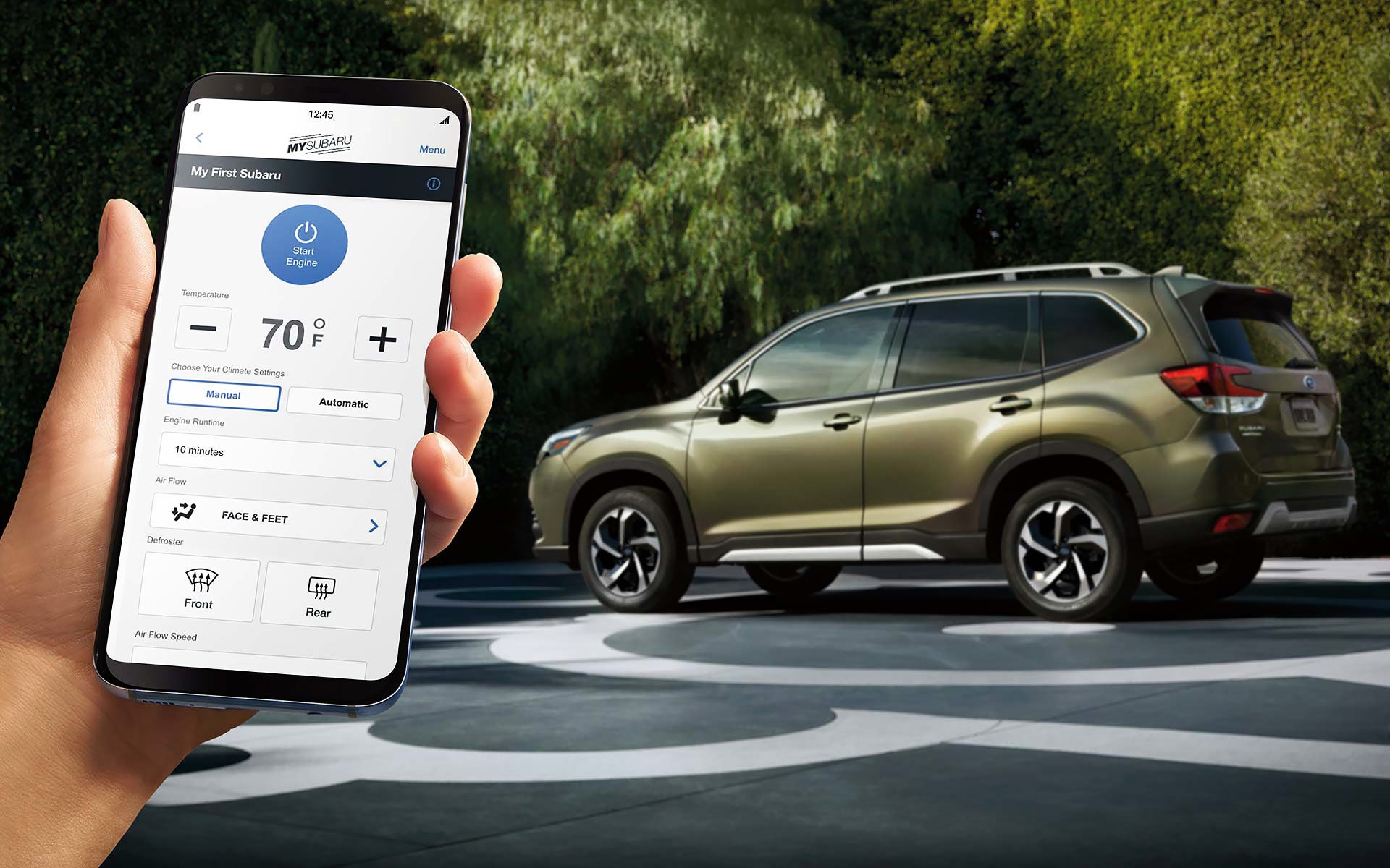 A close-up of a phone showing the Remote Engine Start with Climate Control feature of SUBARU STARLINK® Safety and Security available on the 2022 Forester. | Island Subaru in Staten Island NY